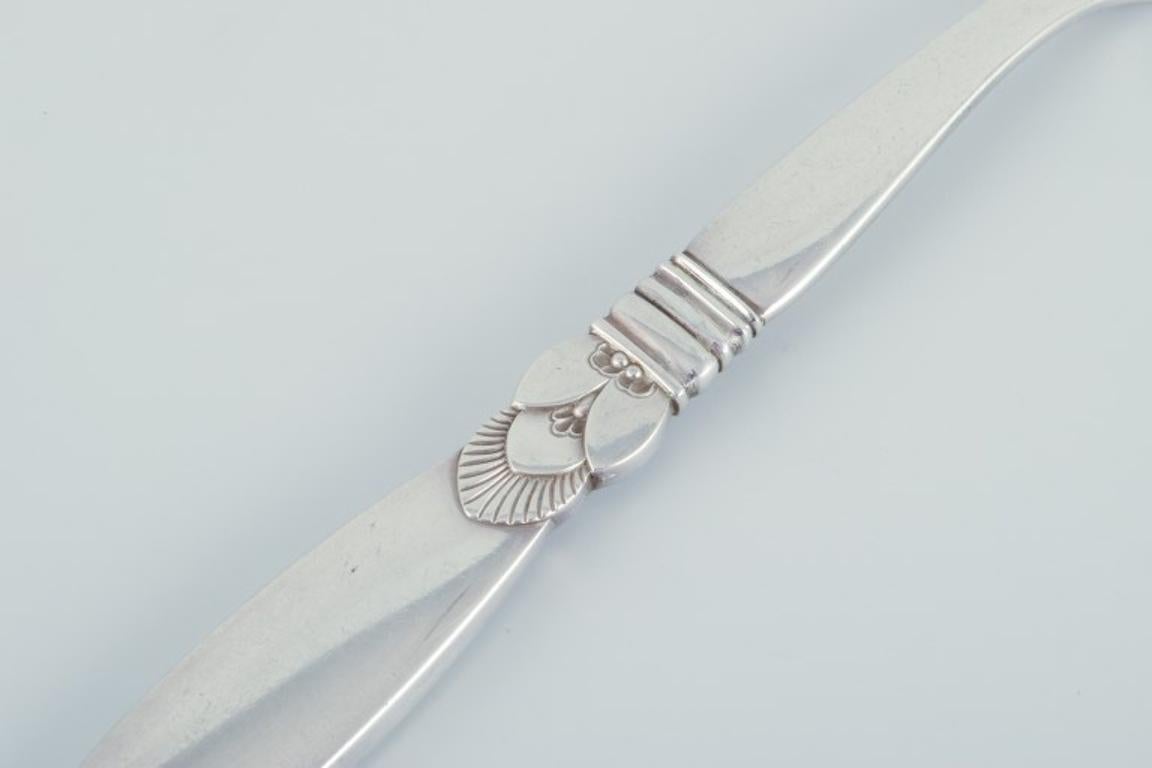 Art Deco Georg Jensen Cactus. Long carving fork in all silver, sterling silver.  For Sale