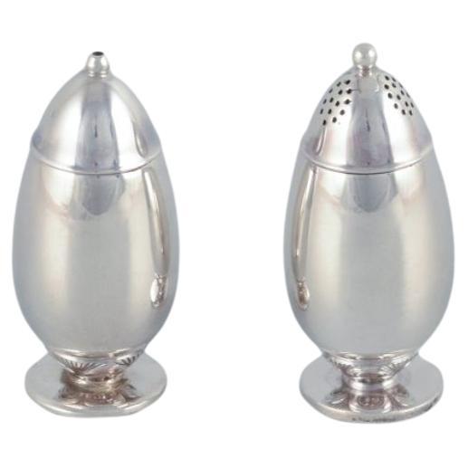 Georg Jensen. Salero y pimentero "Cactus" de plata de ley. en venta