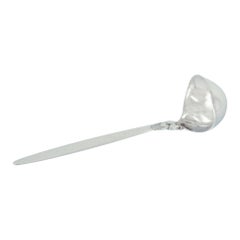 Cactus Georg Jensen. Cuchara salsera de plata de ley.