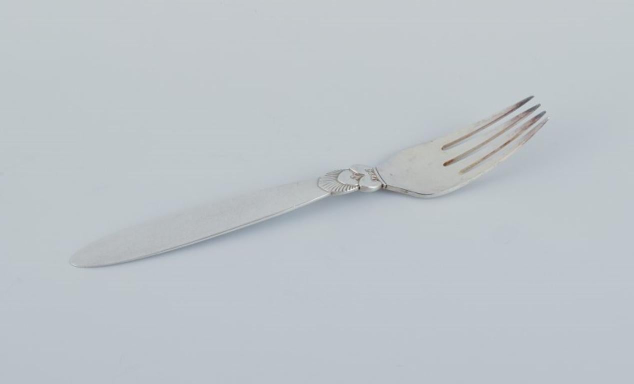 Georg Jensen, Cactus, a set of six sterling silver dinner forks.
Stamped with the hallmark from 1945-1951.
In excellent condition.
Dimensions: L 18.4 cm.



