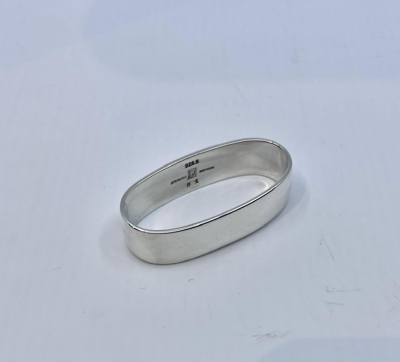 Vintage sterling silver Georg Jensen napkin ring in the Cactus pattern, design #81A by Gundorph Albertus. There were three sizes napkin ring produced, this is the medium size.

Additional Information:
Material: Sterling Silver
Style: Art