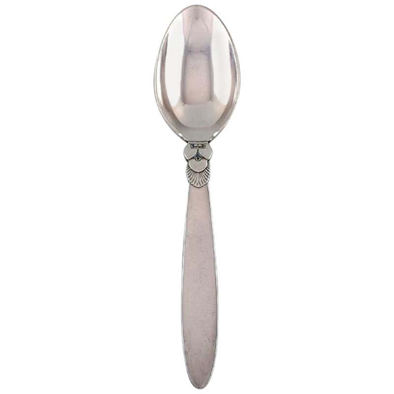 Georg Jensen, Kaktus, set of twelve sterling silver dessert spoons. For Georg Jensen, Kaktus, set of twelve sterling silver dessert spoons. For