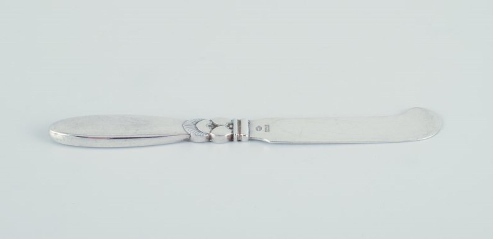 Art Deco Georg Jensen Cactus. Two all-silver butter knives.  For Sale