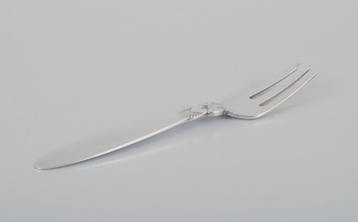 Cactus di Georg Jensen. Due forchette per dolci in argento sterling.
Timbro con marchio 1933-1944 e marchio dopo il 1944.
In ottime condizioni.
Dimensioni: L 13,0 cm.