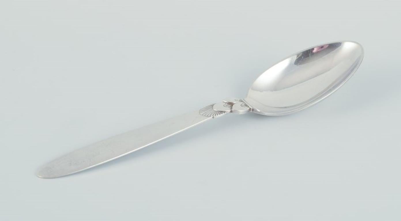 Georg Jensen Cactus. Two dessert spoons in sterling silver.
Hallmarked after 1944.
In perfect condition.
Dimensions: Length 17.0 cm.