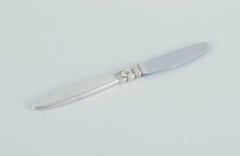Georg Jensen Cactus. Two long-handled lunch knives in sterling silver.