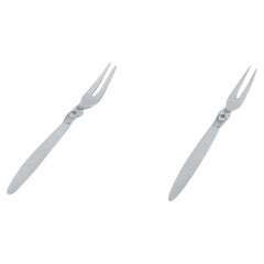 Georg Jensen, Cactus, deux fourchettes de présentation/ fourchettes à franges en argent sterling.