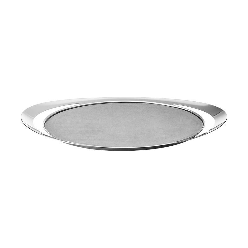Has there ever been a more stylish way to serve breakfast in bed than with this elegantly shaped stainless steel tray? The sculptural form is lined with subtle grey artifical microfibre PU suede leather which contrasts beautifully with the shiny