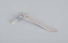 Georg Jensen "Continental" child pusher in 830 silver. Dated 1926