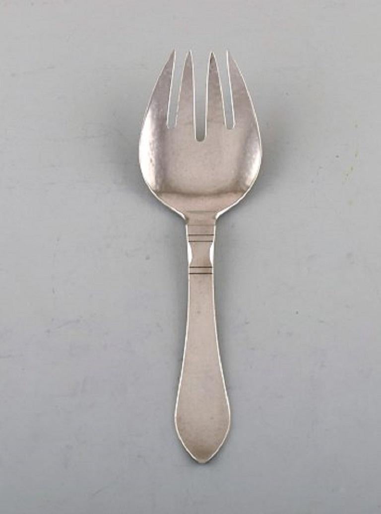 Georg Jensen Continental salad set in hammered sterling silver.
All silver. Dated 1933-1944.
Measures: 22.5 cm.
Stamped.
In very good condition.
The cutlery was designed by Georg Jensen in 1906.






  