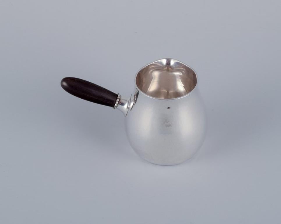 Danese Cremiera Georg Jensen in argento sterling con manico in ebano. Model 80A. in vendita