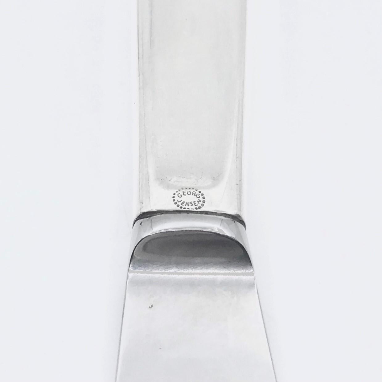 Georg Jensen child/fruit knife with sterling silver handle and stainless steel blade, item 072 in the Cypress pattern, design #99 by Tias Eckhoff. Norwegian designer Tias Eckhoff’s Cypress was the winning design in a competition to design a flatware