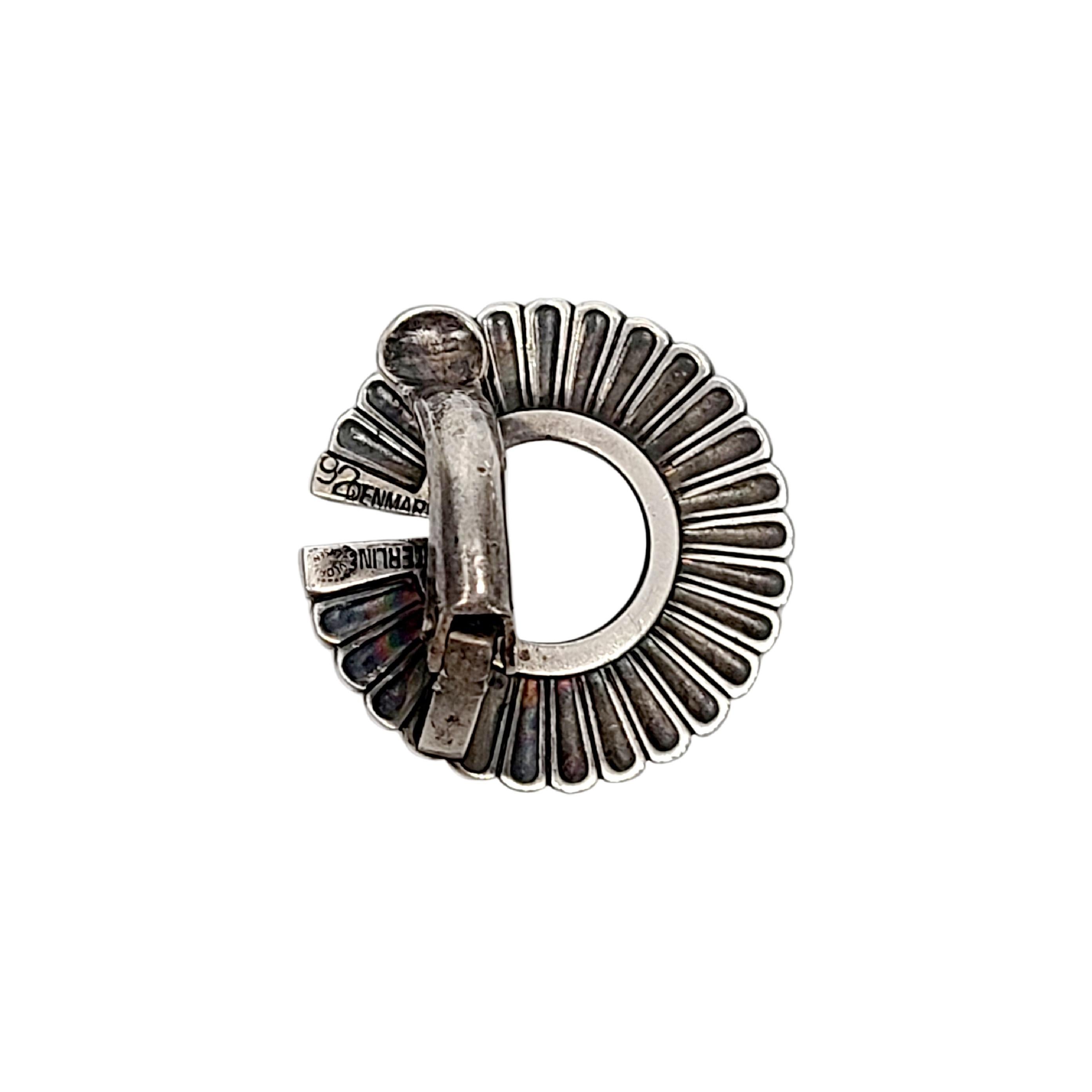 Georg Jensen sterling silver #92 clip-on single earring.

This beautiful earring features a round collar-like design.

Measures 7/8