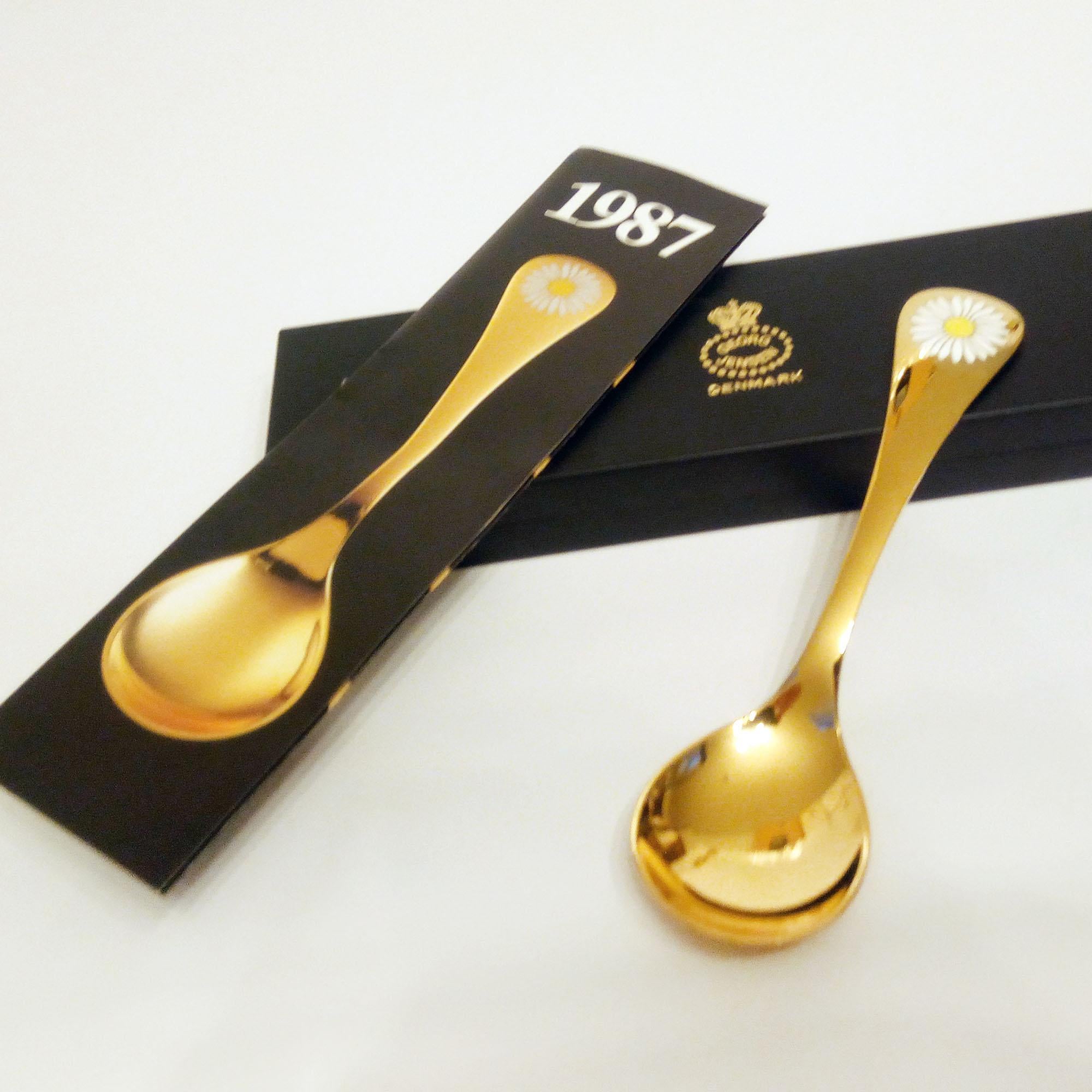 Annual Spoon 1987 in original box, designed by Annelise Björner, edited by Georg Jensen.
Annual Spoons series began in 1971. Each spoon is crafted in sterling silver, then gold plated and enameled with a wildflower chosen for that year. The 1987