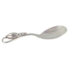 Georg Jensen, Denmark. "Blossom" sugar spoon in sterling silver.