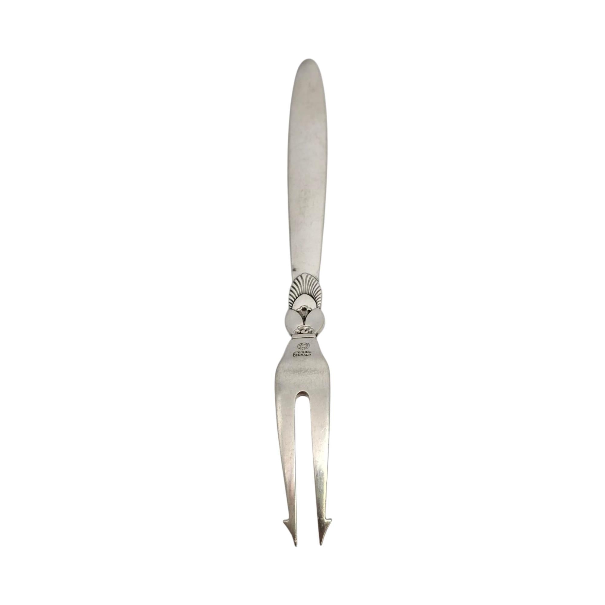 Sterling silver pickle/olive fork in the Cactus pattern by Georg Jensen Denmark.

No monogram or engraving

Created by long-time Jensen designer Gunorph Albertus, the Cactus pattern was introduced in 1930 and features an Art Deco cactus blossom