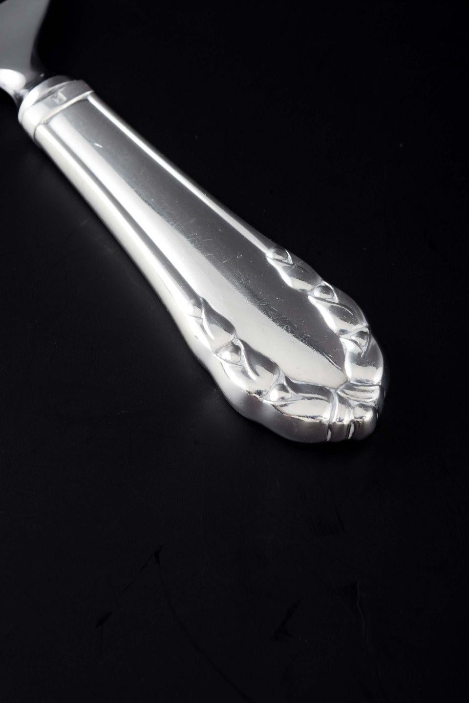PRE-OWNED GOODS ARE EXEMPT FROM IMPORT TARIFFS FOR U.S., UK, AUSTRALIAN & CANADIAN CUSTOMERS.   
THEREFORE, NO IMPORT TARIFFS WILL BE APPLICABLE TO YOUR PURCHASE. 

Georg Jensen, Denmark.
Bottle opener in the 
