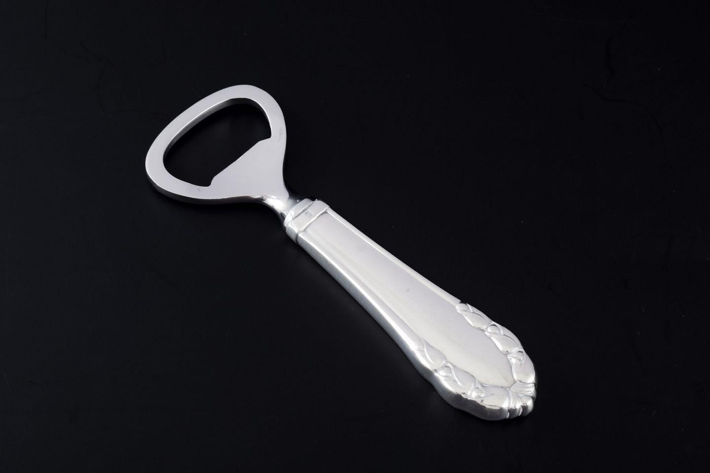 Georg Jensen, Denmark. "Lily of the Valley" bottle opener in sterling silver. For Sale