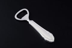 Georg Jensen, Denmark. "Lily of the Valley" bottle opener in sterling silver.