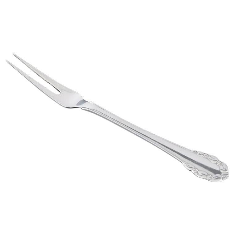 Georg Jensen, Denmark. "Lily of the Valley" cold meat fork in sterling silver.