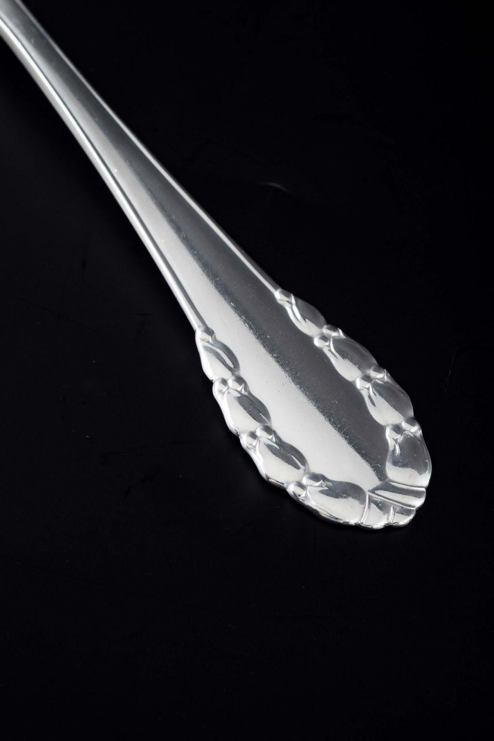 PRE-OWNED GOODS ARE EXEMPT FROM IMPORT TARIFFS FOR U.S., UK, AUSTRALIAN & CANADIAN CUSTOMERS.   
THEREFORE, NO IMPORT TARIFFS WILL BE APPLICABLE TO YOUR PURCHASE. 

Georg Jensen. Dinner fork in the “Lily of the Valley” pattern. Mirror-polished