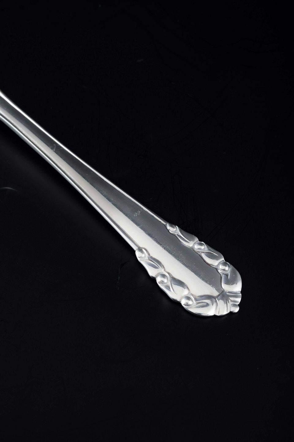 PRE-OWNED GOODS ARE EXEMPT FROM IMPORT TARIFFS FOR U.S., UK, AUSTRALIAN & CANADIAN CUSTOMERS.   
THEREFORE, NO IMPORT TARIFFS WILL BE APPLICABLE TO YOUR PURCHASE. 

Georg Jensen. Lunch fork in the “Lily of the Valley” pattern. Mirror-polished