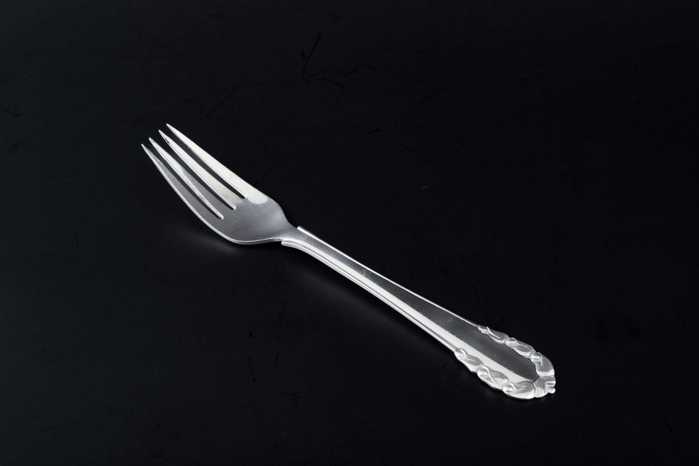 Georg Jensen, Denmark. "Lily of the Valley" lunch fork in sterling silver.