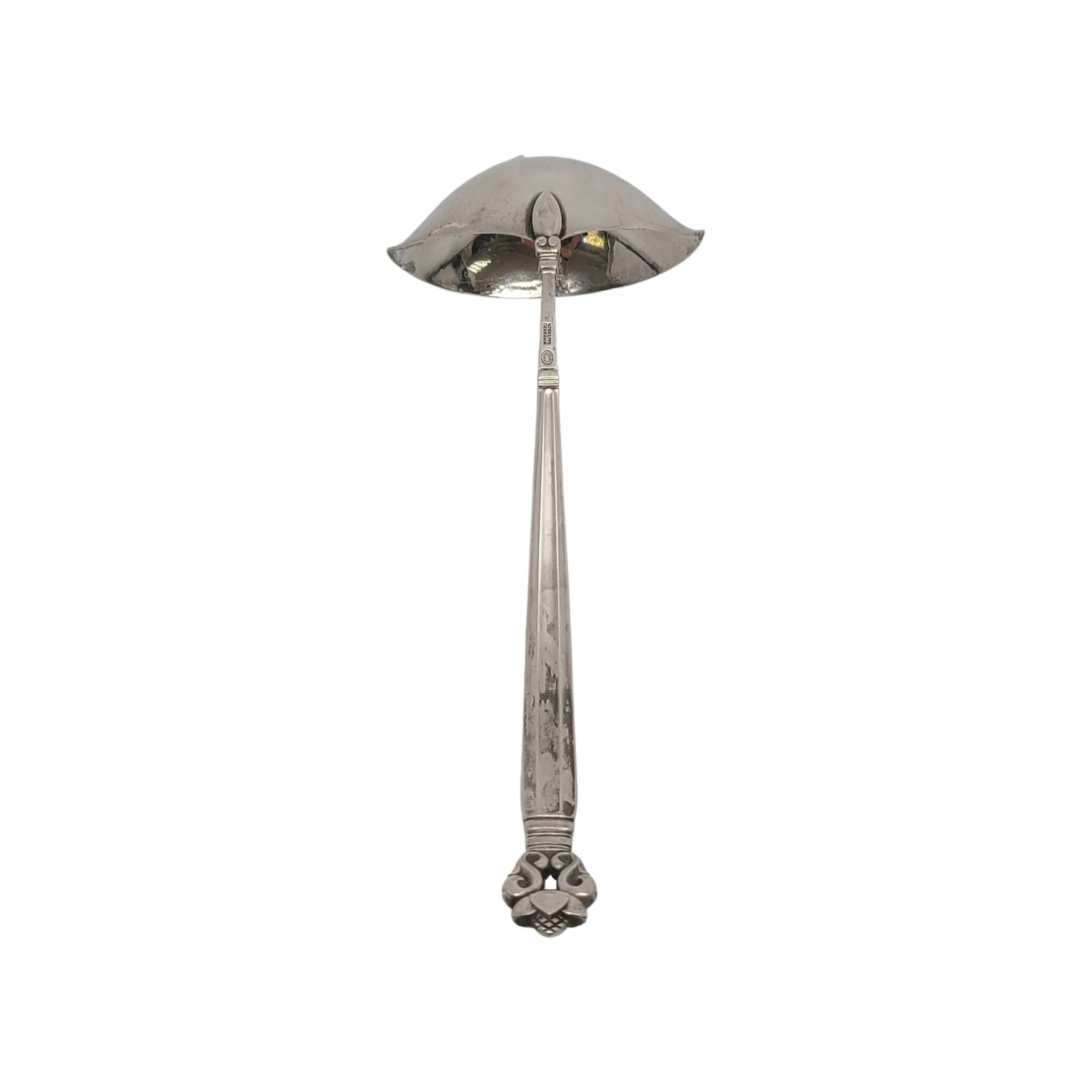 Vintage Georg Jensen Denmark sterling silver gravy ladle in the Acorn pattern.

No monogram

The Acorn pattern was introduced in 1915 as a collaboration between Georg Jensen and designer Johan Ronde. The Acorn pattern, which combines Art Nouveau and