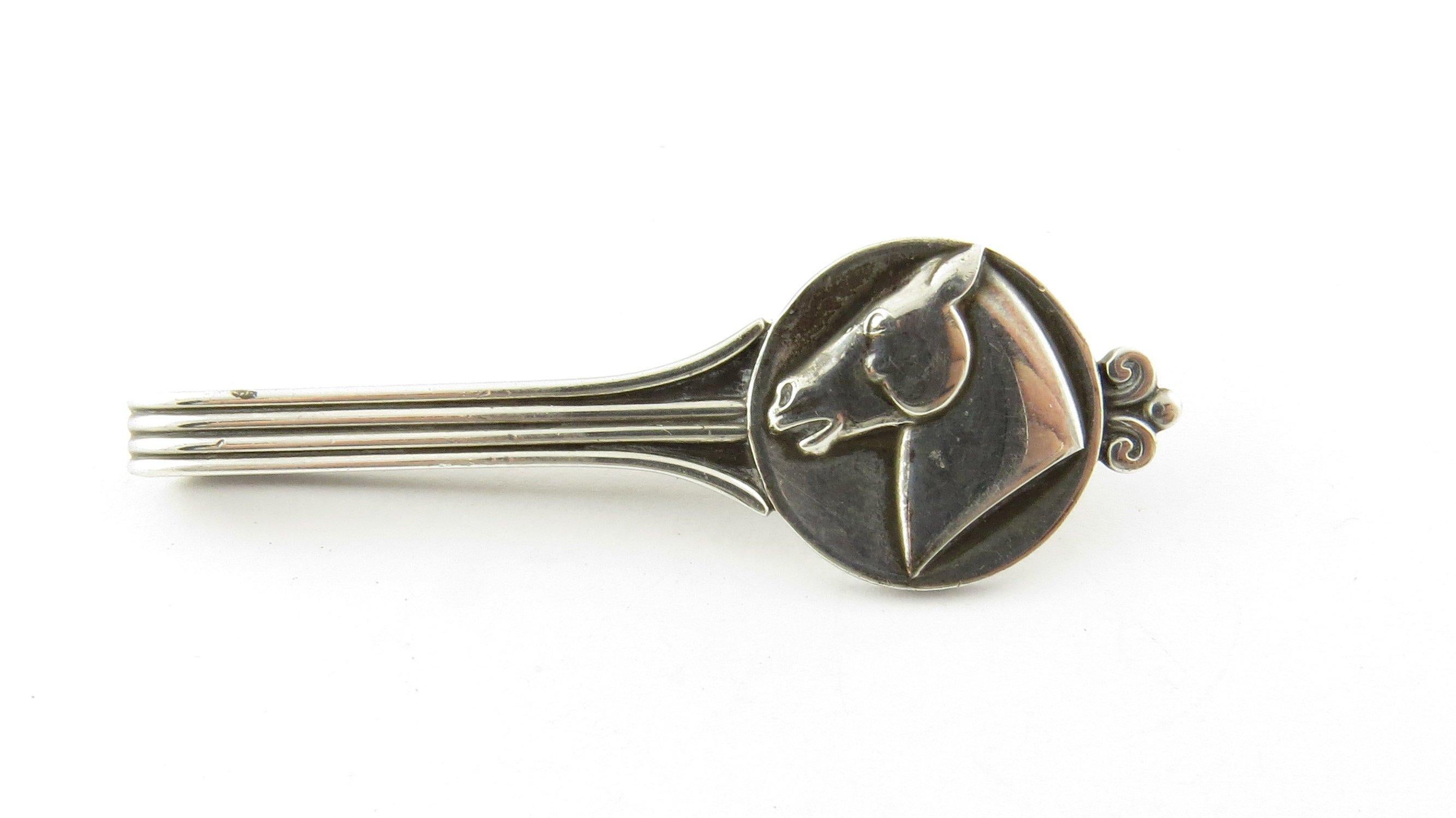 Vintage Georg Jensen Denmark Sterling Silver Horsehead Tie Bar #65- This elegant tie bar by Georg Jensen features a proud horse head in profile crafted in classic sterling silver. Size: 56 mm x 18 mm Weight: 6.1 dwt. / 9.5 gr. Hallmark: GEORG JENSEN