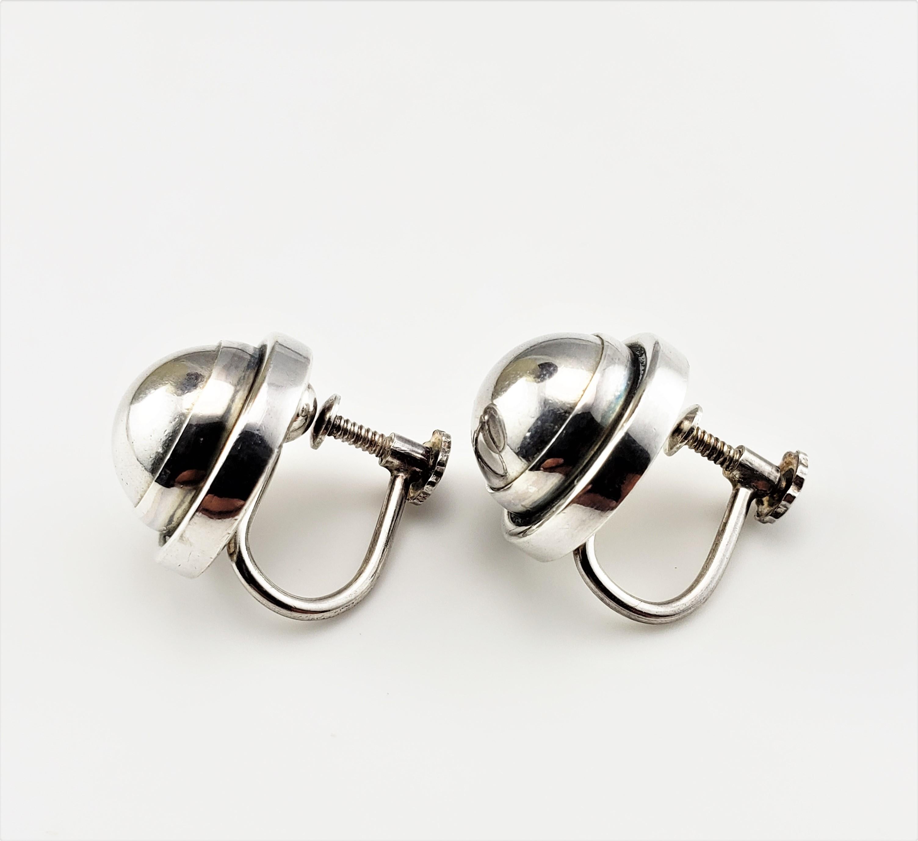 Georg Jensen Sterling Silver Screw Back Earrings #86D-

These lovely screw back earrings are crafted in beautifully detailed sterling silver.

Size:   14 mm  (10 mm thick)

Weight:  6.8 dwt./ 10.6 gr.

Hallmark:  Georg Jensen, 86D, 925S,