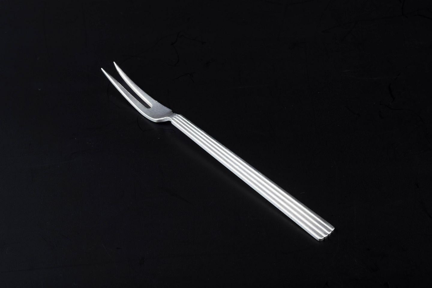 Georg Jensen, Denmark. Sterling silver serving fork in Bernadotte pattern