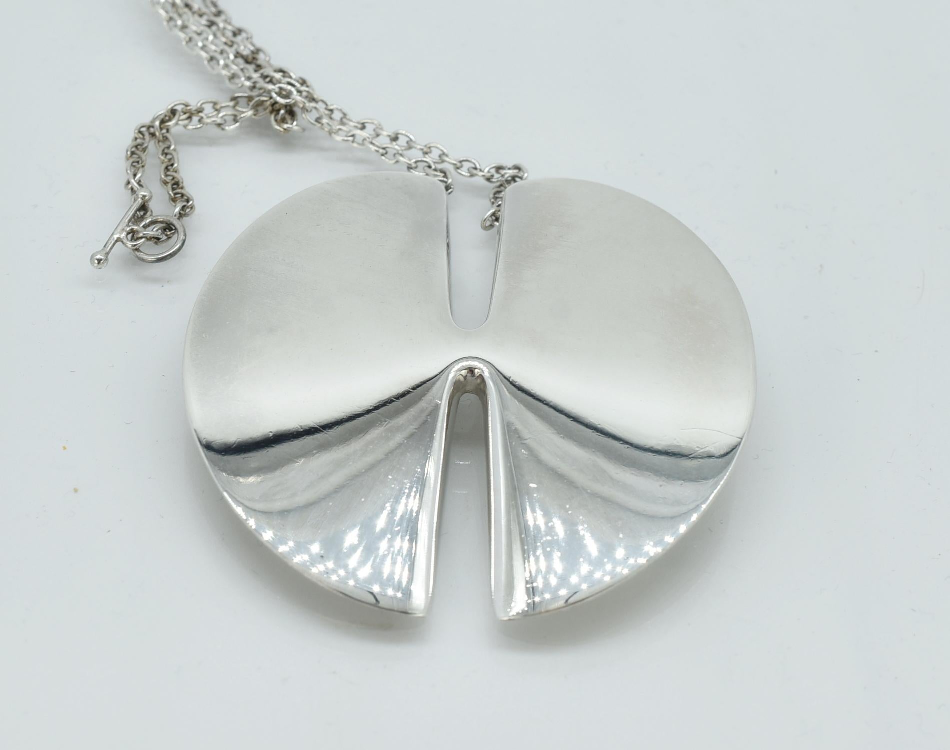 Georg Jensen modern designed disk pendant necklace. Sterling Silver, # 337A designed by Nanna Ditzel. 2 3/8