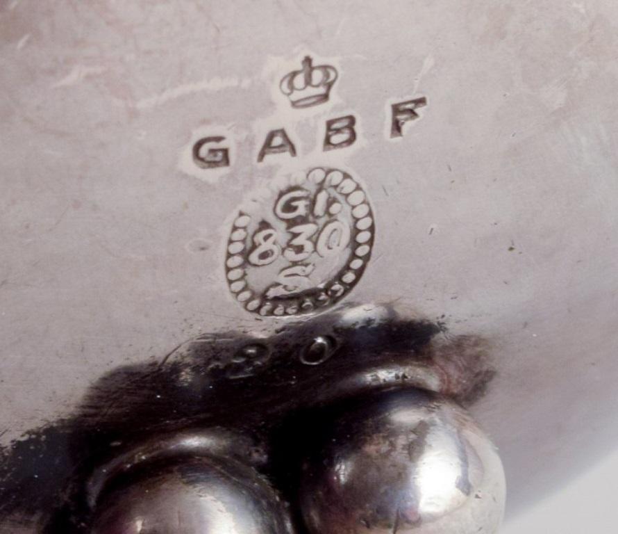 Georg Jensen, early tea strainer with holder in 830 silver. In Excellent Condition In København, Copenhagen