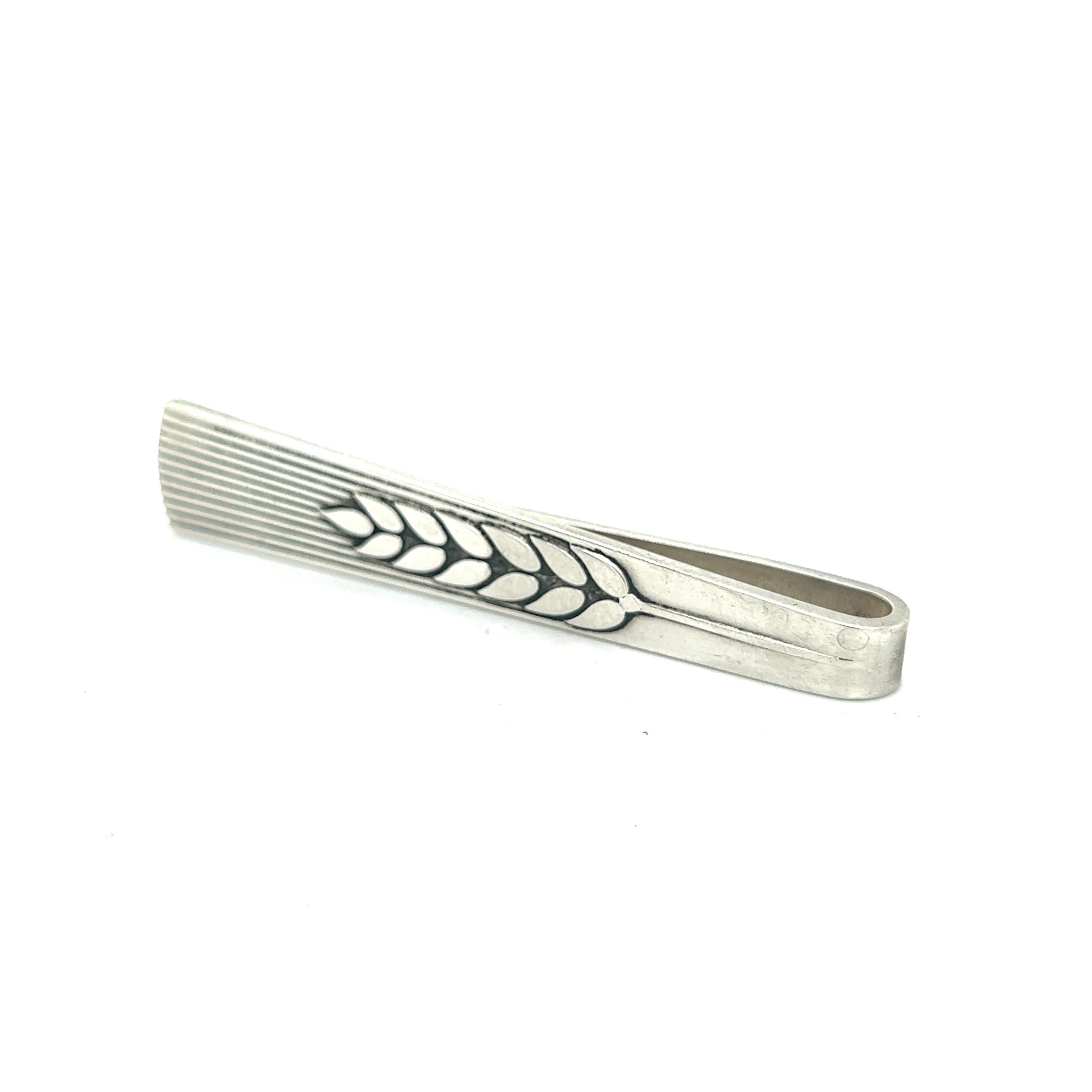 Authentic Georg Jensen Estate Money Clip Tie Bar Silver GJ15

This elegant Authentic Georg Jensen Men's Money Clip Tie Bar is made of sterling silver and has a weight of 11.09 grams.

TRUSTED SELLER SINCE 2002

PLEASE SEE OUR HUNDREDS OF POSITIVE