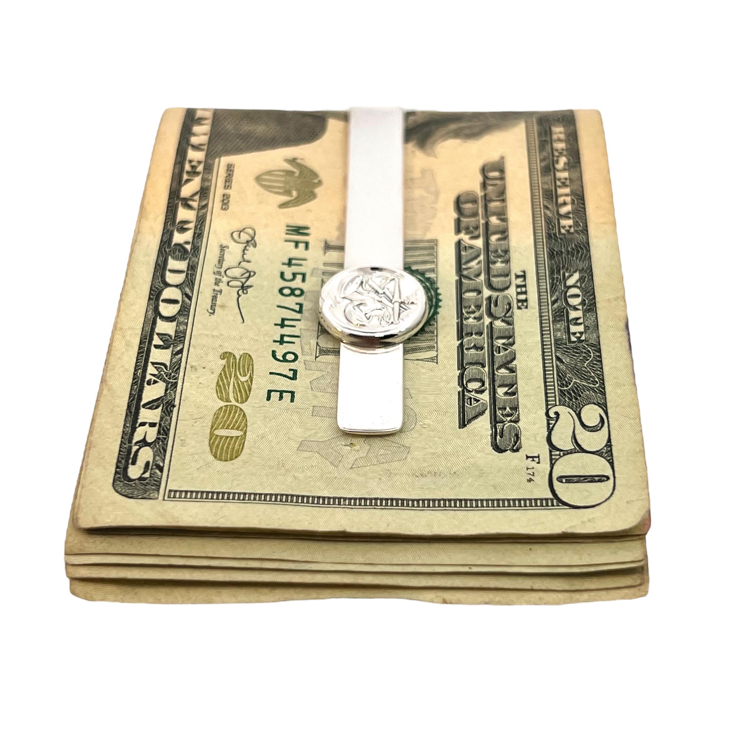 Authentic Georg Jensen Estate Money Clip Tie Cip Silver GJ32

This elegant Authentic Georg Jensen Men's Money Clip Tie Clip is made of sterling silver and has a weight of 15.06 grams.

TRUSTED SELLER SINCE 2002

PLEASE SEE OUR HUNDREDS OF POSITIVE