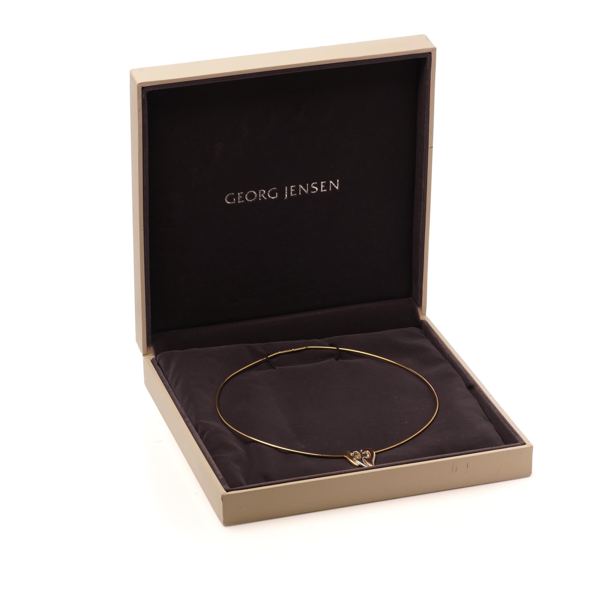 Georg Jensen Fusion 18kt Gold Dreifarbiger Herz-Anhänger Halskette mit Original Box

Eine Vintage-Halskette von Georg Jensen Fusion mit dem ikonischen, ineinander greifenden Herzanhänger aus 18-karätigem Gelb-, Weiß- und Roségold. Die drei von Nina