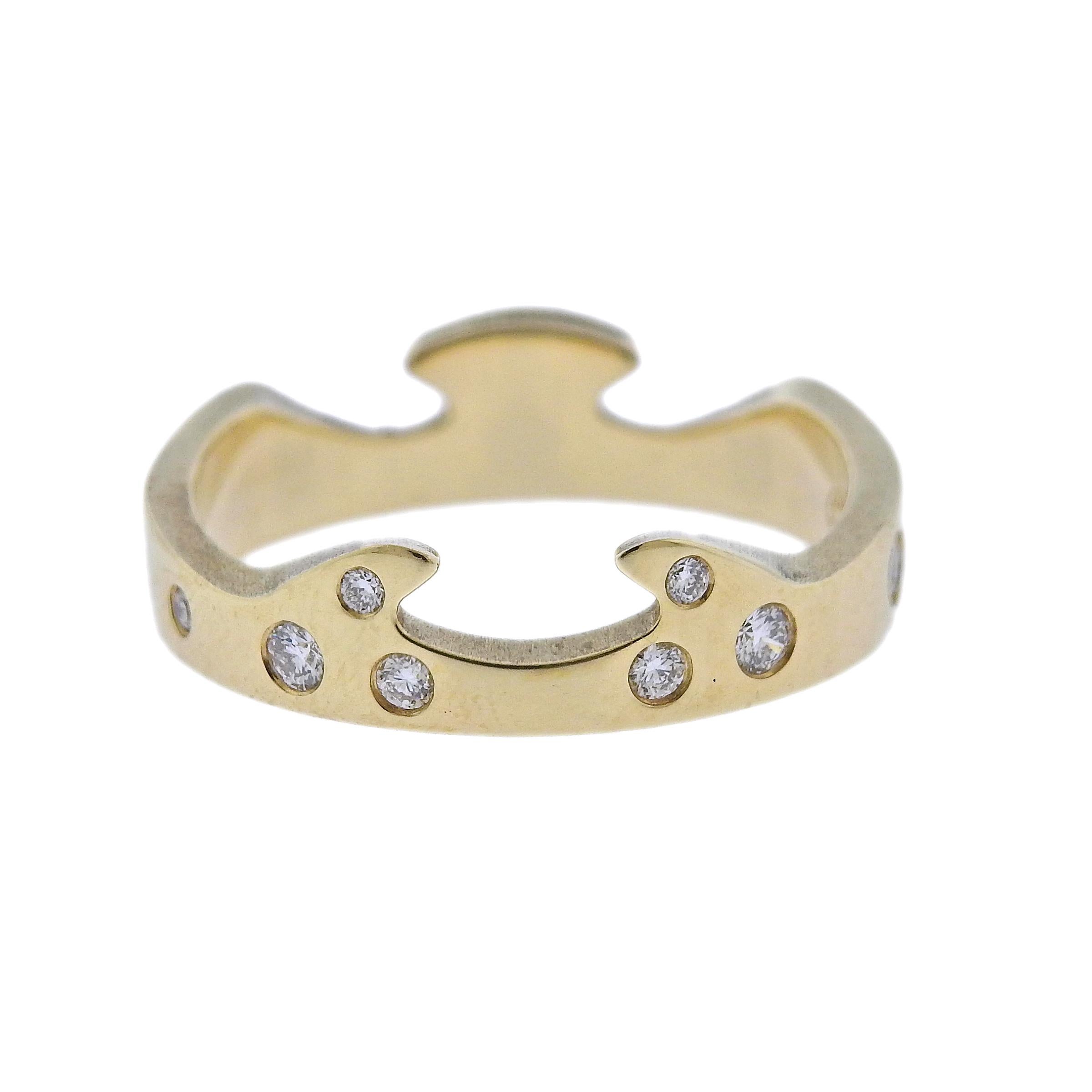  Georg Jensen diamond end ring from current Fusion collection set with 0.16ctw VS/G white diamonds. Ring is 4mm wide and available in following sizes:  56; 58; 59. Weight is 5.2 grams. Marked: GJ, Denmark, 750, ring size, NK.