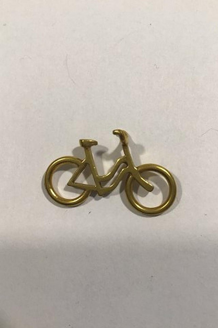 operation cute historic Georg Jensen Gilt Brass Woman's Bicycle Pendant For Sale at 1stDibs