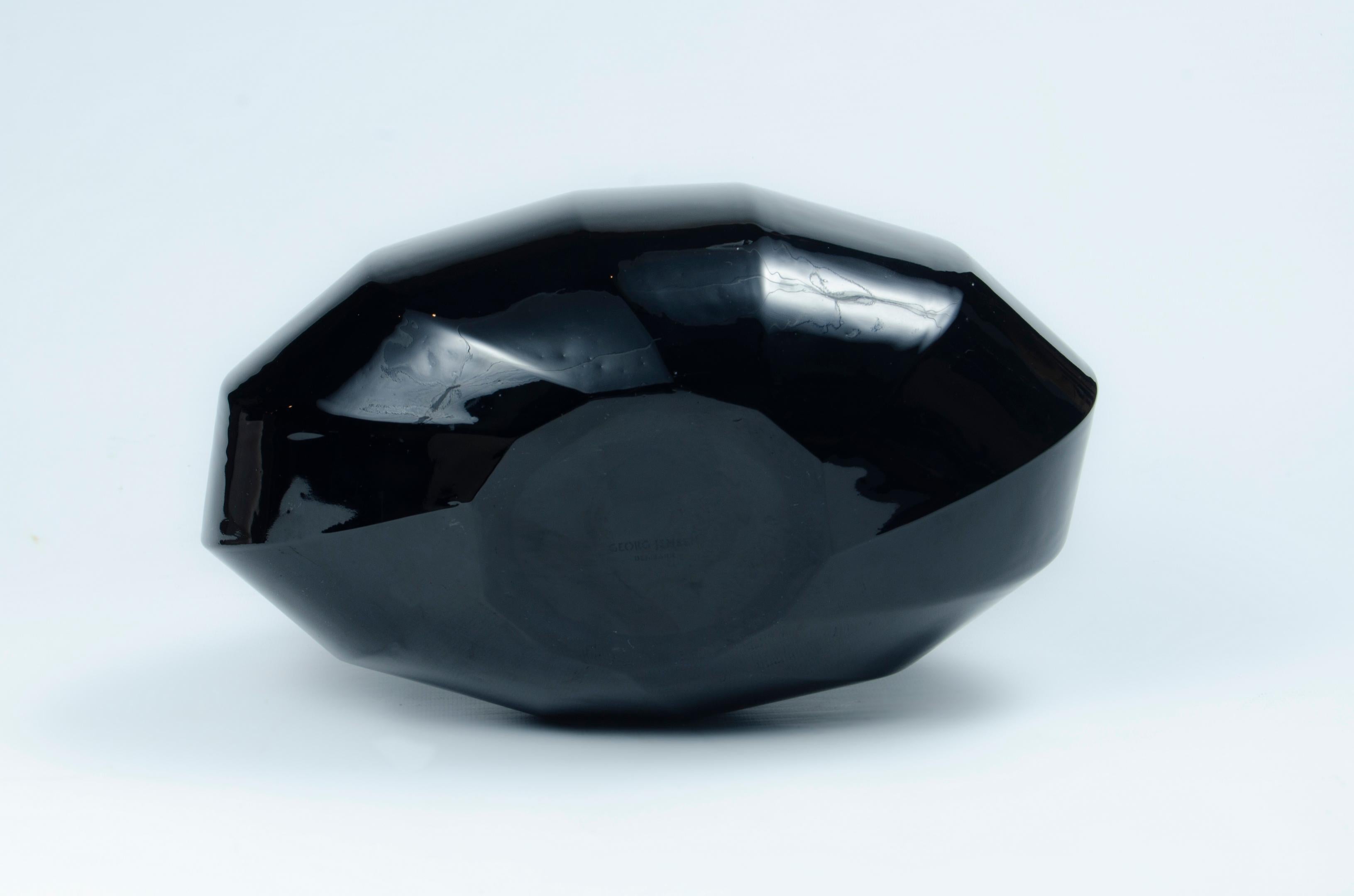 Georg Jensen glass vase
black, faceted,
1960 mid century origin Denmark
George Jensen manufacturing
perfect condition 550 20%.
 