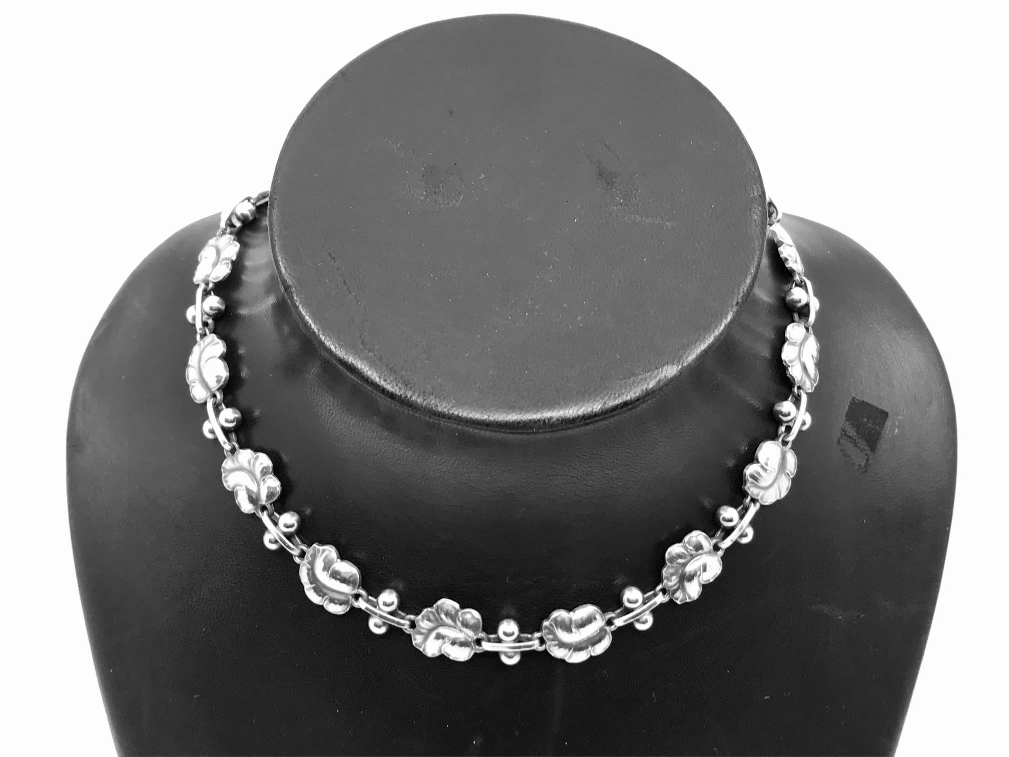 Sterling silver Georg Jensen Grapes necklace, design #96A by Harald Nielsen from the 1920s.
Measures 15 5/8