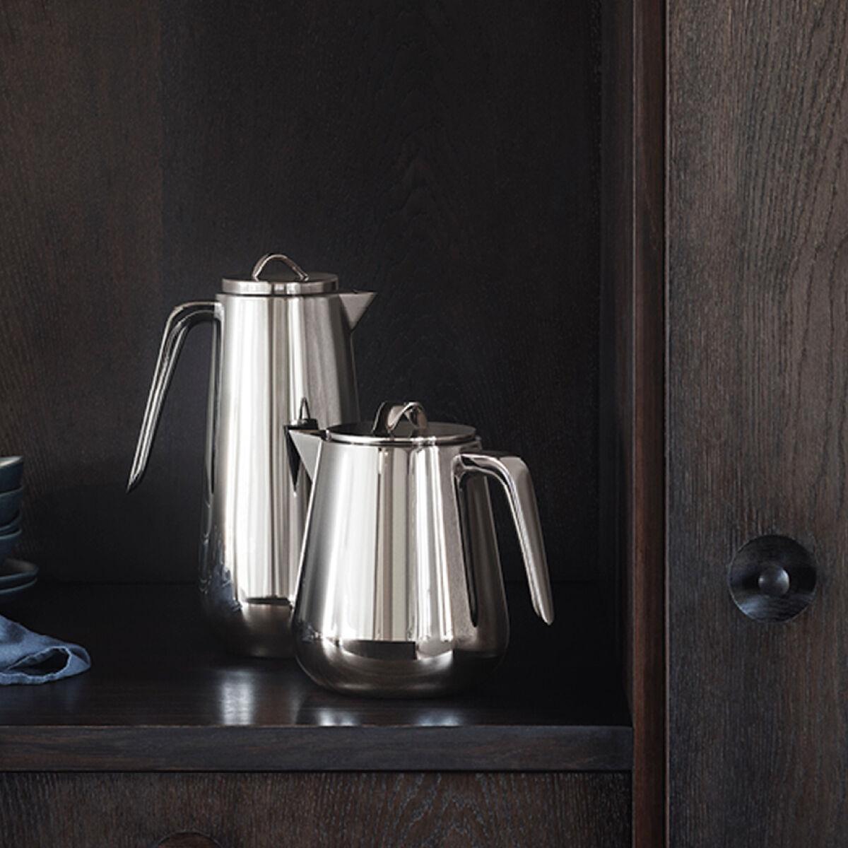 Elevate your morning cuppa and bring some Scandinavian minimalism to afternoon tea with this unique stainless steel tea pot. The ergonomic and modern shape combined with the high shine of the surface give it an almost sculptural quality that is sure