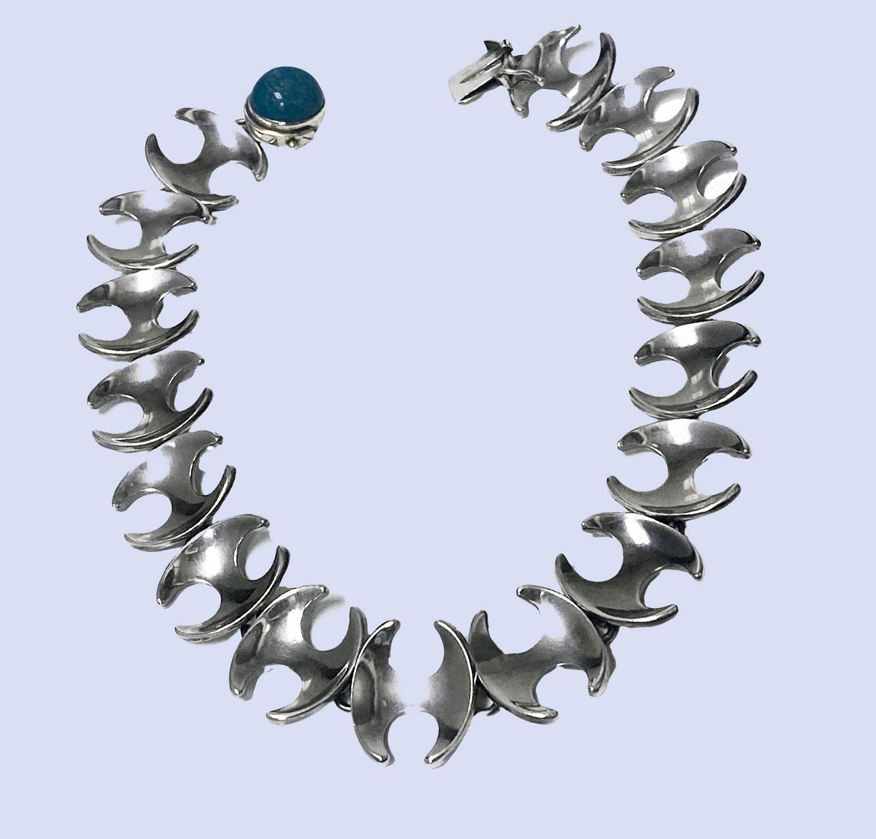 Rare 1950's Vintage Georg Jensen Henning Koppel Sterling Silver Necklace is set with amazonite clasp. Designed by Henning Koppel in Koppel’s signature H design for Georg Jensen. Post 1945 Georg Jensen mark and 925S Sterling Denmark design number130B