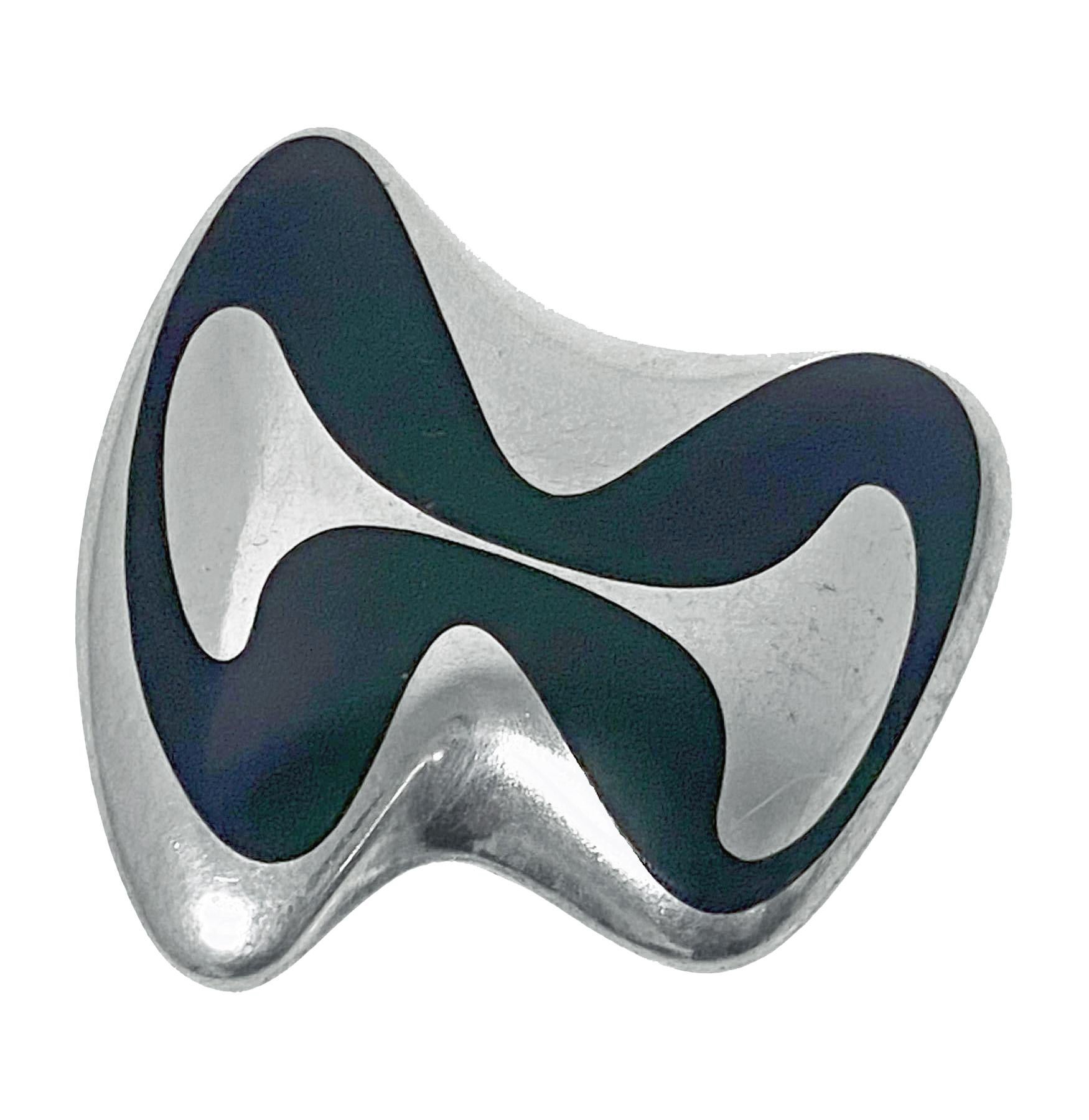 Georg Jensen Henning Koppel abstract sculptural enamel and sterling Brooch, Denmark, C.1954. The Brooch of sculptural abstract form, green enamel. Full marks to reverse and HK for Henning Koppel and numbered 315. See p 118 Georg Jensen Jewelry.