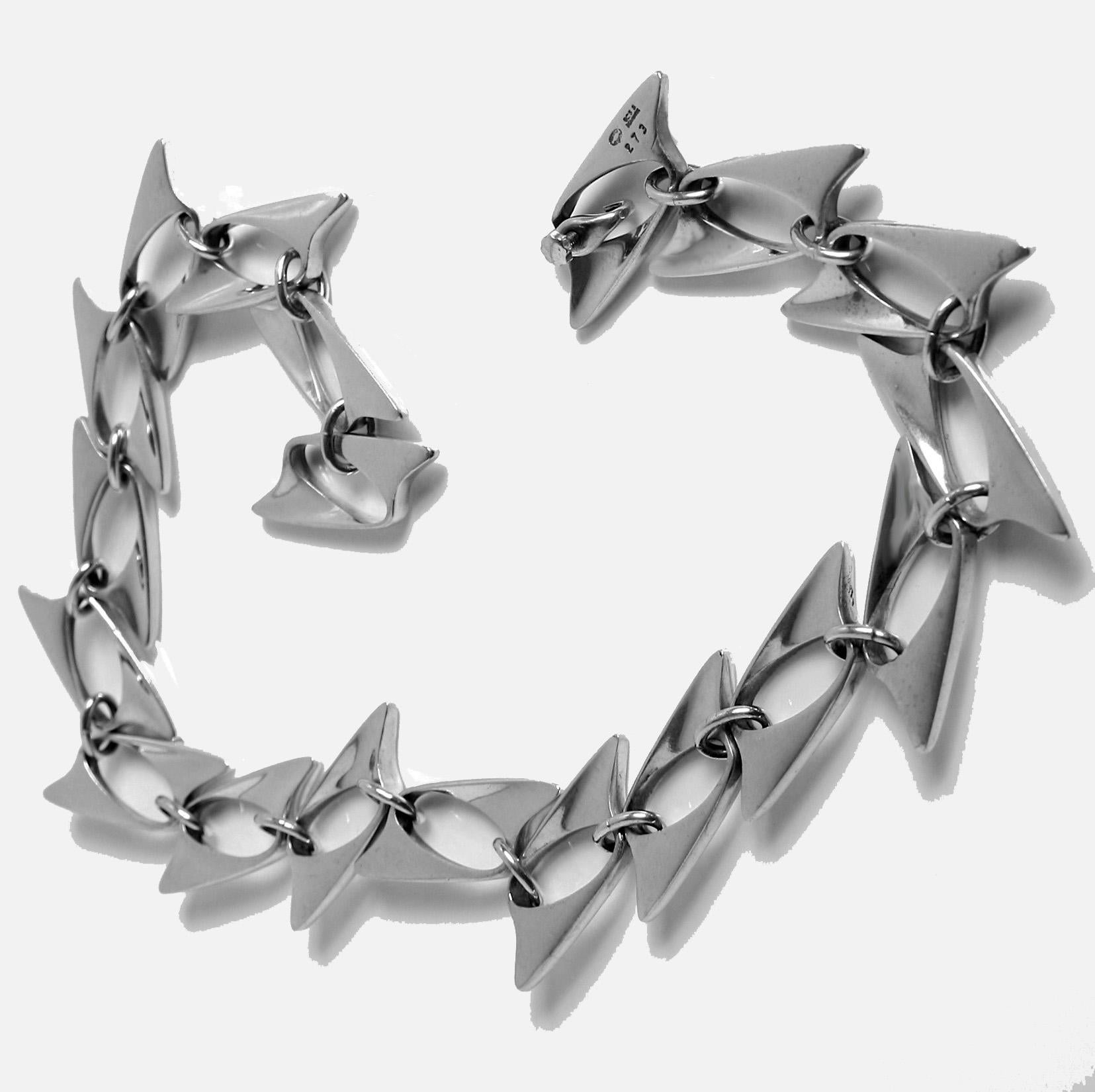 Georg Jensen Henning Koppel Sterling Necklace, Denmark C.1960. The Necklace of articulated abstract design, full Georg Jensen post 1945 oval dotted punch mark, 925S  Denmark and numbered 273 to reverse, original screw fitment clasp. Length: 18.5
