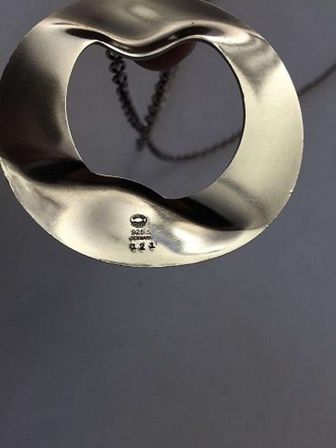 Georg Jensen Henning Koppel Sterling Silver Pendant with Chain No 121. Pendant measure 6.5 cm x 6 cm / 2 1/2 in. x 2 1/3 in. Chain measures 70 cm / 27 9/16 in. Weighs 43 g / 1.60 oz.