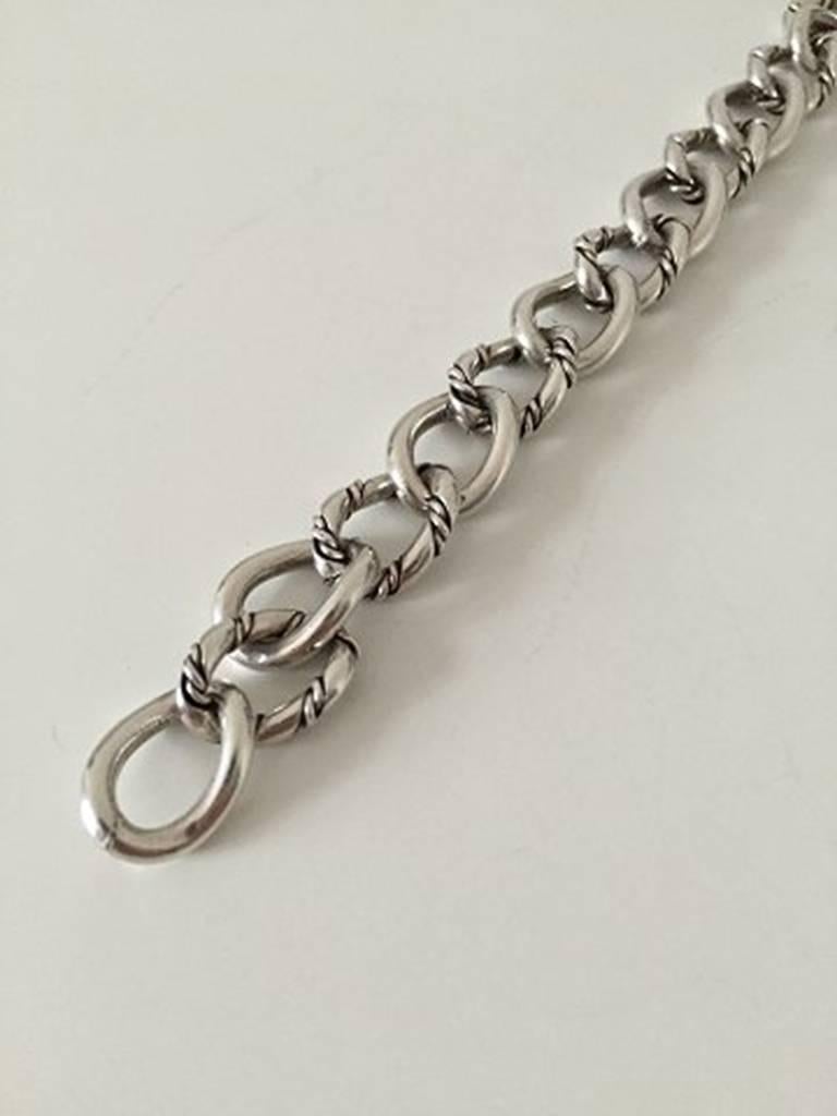 Georg Jensen Inc Sterling Silver Bracelet No 100. Measures 19.1 cm / 7 33/64 in. Designed by Lapaglia. Weighs 51 g / 1.75 oz.