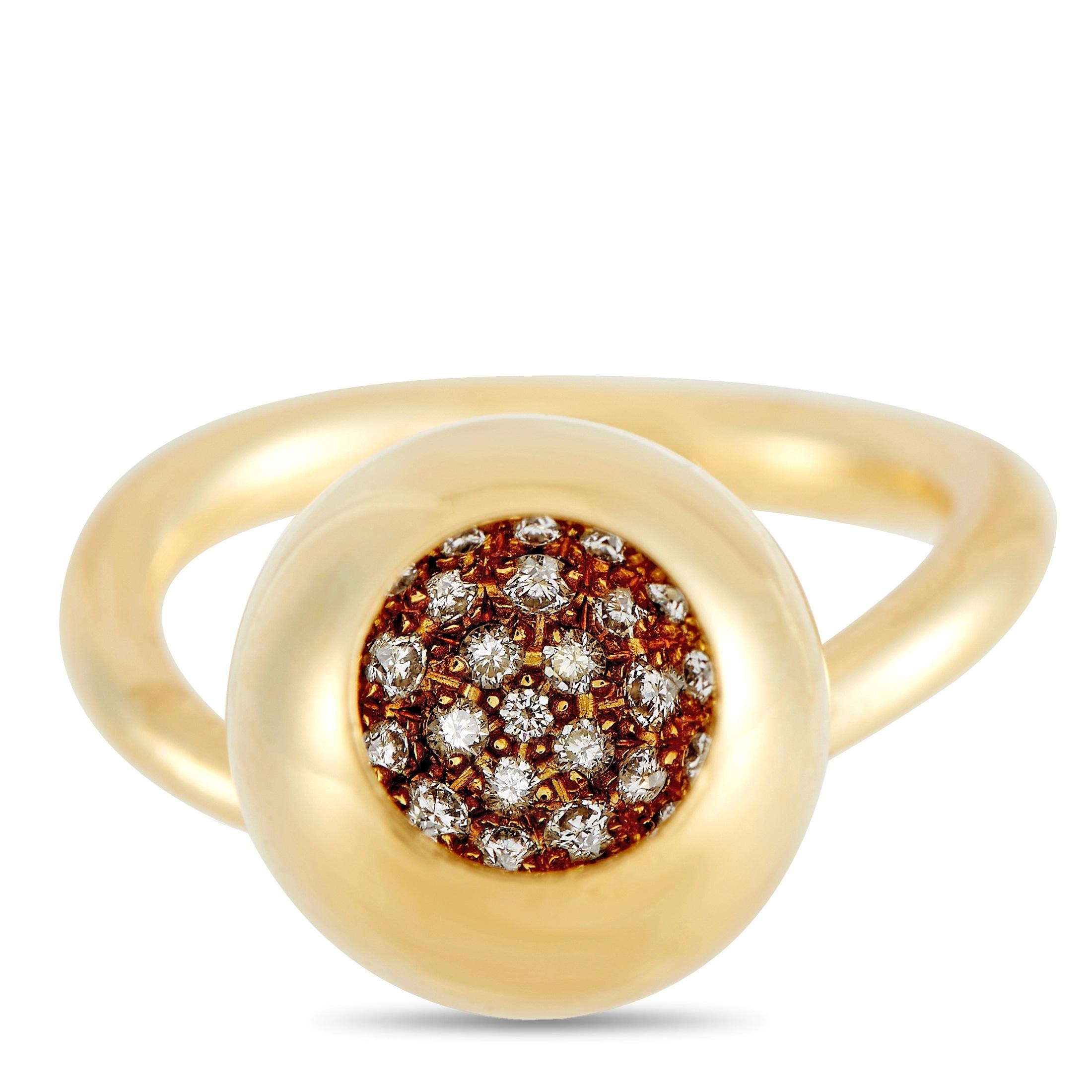 This spectacular 18K Yellow Gold ring is a collaboration between American jewelry designer Jacqueline Rabun and the iconic Georg Jensen brand. Attached to a delicate 3mm band, you’ll find a hanging orb cave that is elevated by inset diamonds