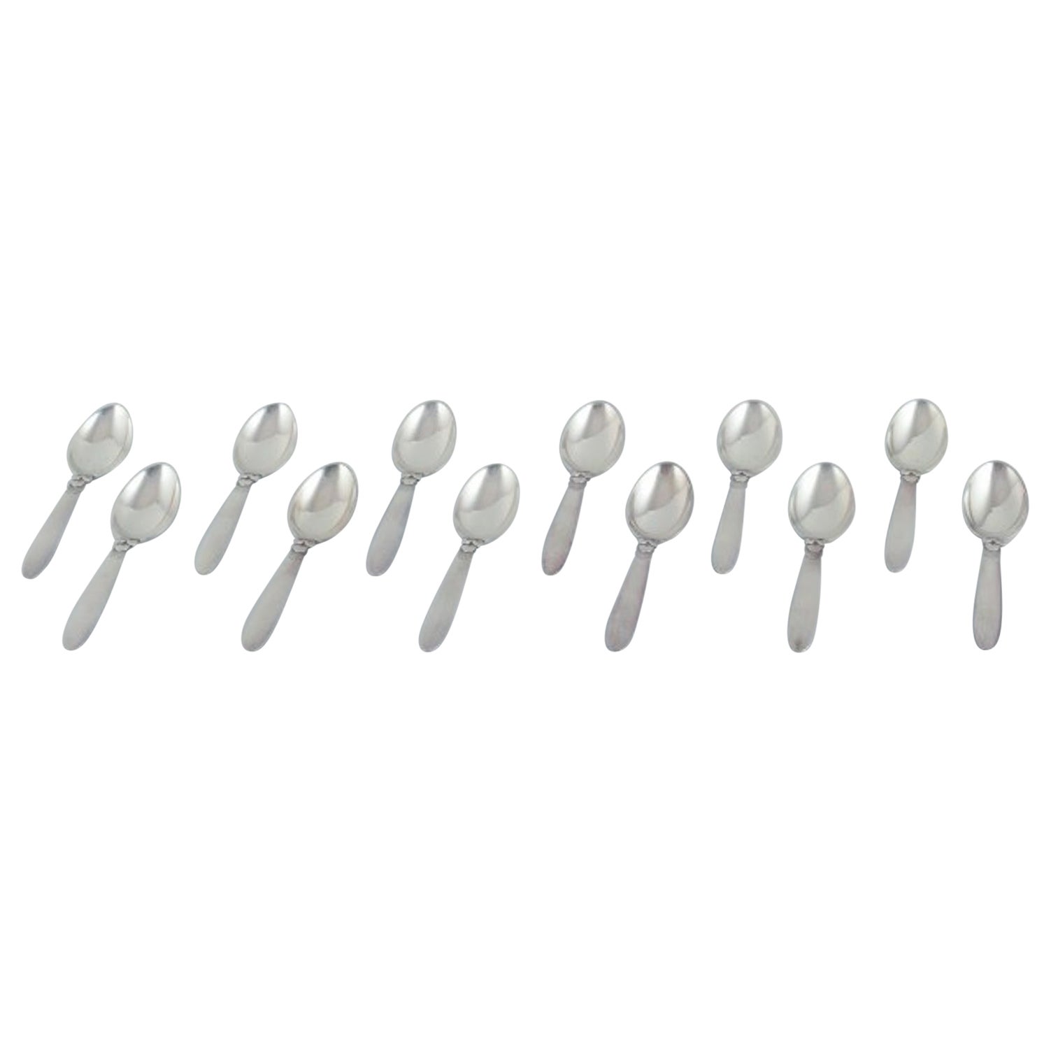 Georg Jensen, Kaktus, ensemble de douze cuillères à dessert en argent sterling.