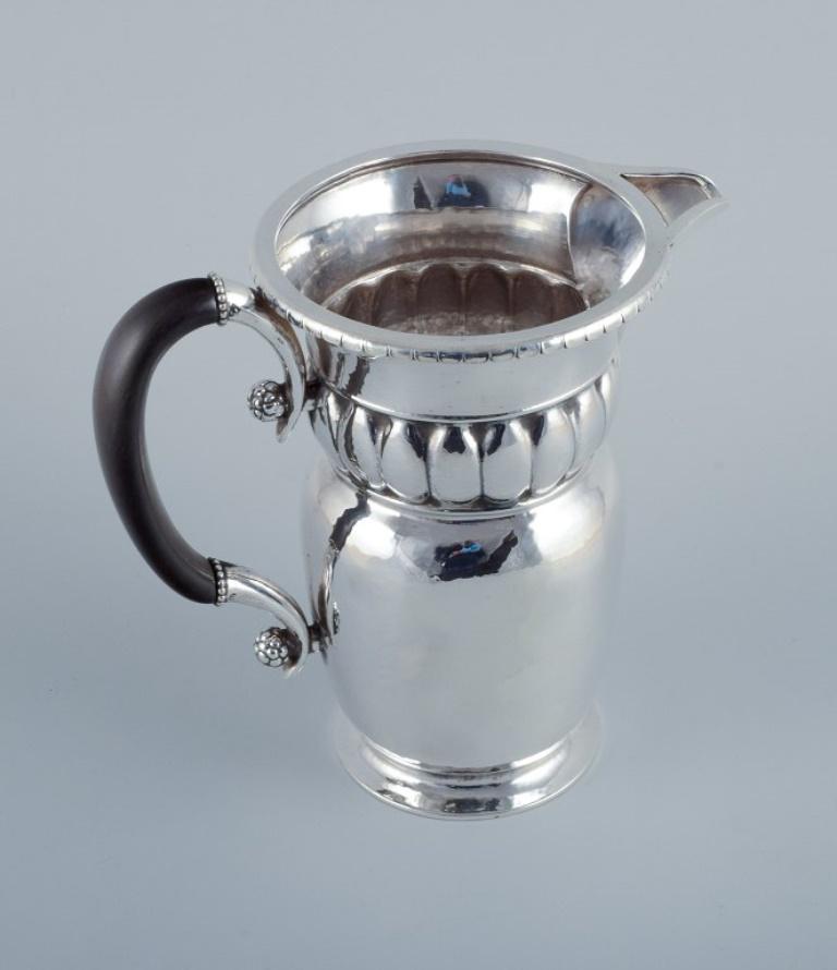 Danish Georg Jensen, large Art Nouveau pitcher in sterling silver. Early and rare model For Sale