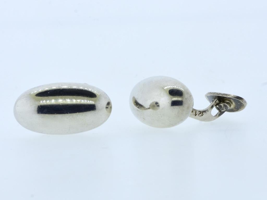 Georg Jensen large size sterling silver vintage cufflinks, in fine condition, These unusual cufflinks are 1.25 inches long, they weigh 20.0 grams and are 925 Sterling Silver, made in Denmark. Marked Georg Jensen, 925, and the design number 121,